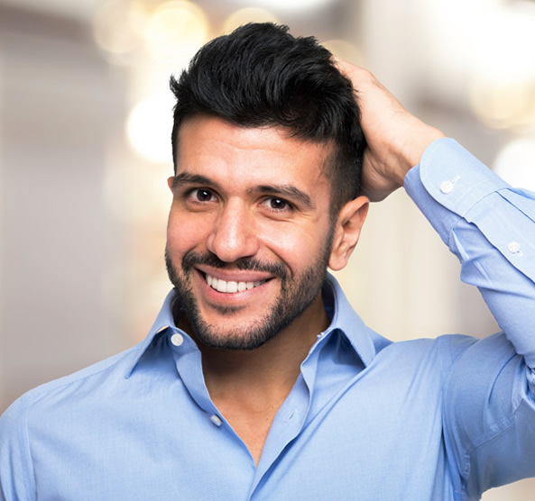 man running hands through hair