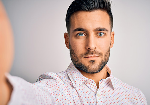 Total Hair Restoration man looking at camera
