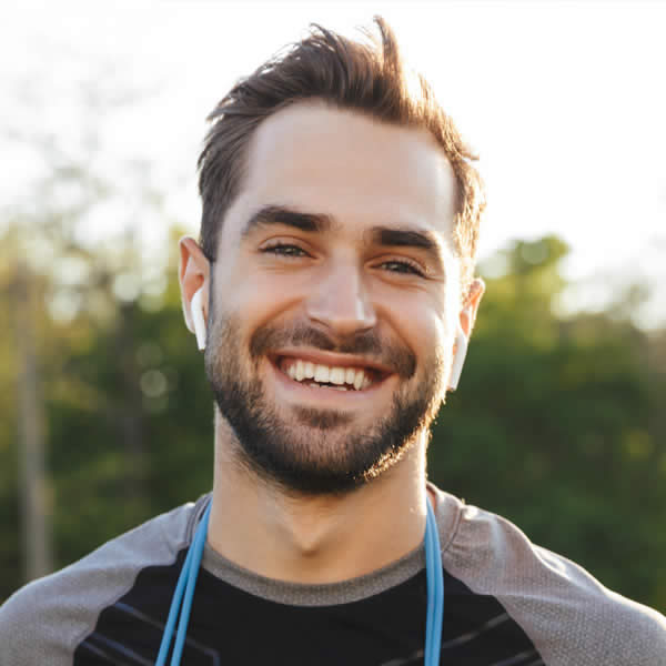 Total Hair Restoration smiling man with beard